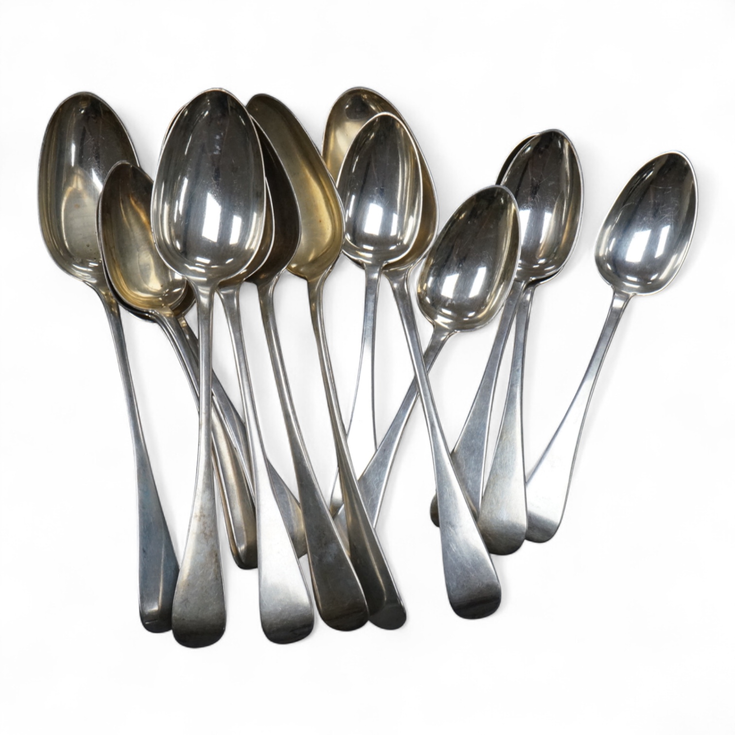 A set of six early Victorian silver Old English pattern table spoons, by William Bateman, London, 1837, 22.5cm, together with a set of eight provincial silver Old English pattern dessert spoons, Thomas Wheatley, Newcastl